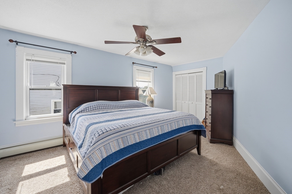 59 Woodmont Street West Springfield, MA 01089 - Photo 19 of 30 a bedroom with a bed and a window