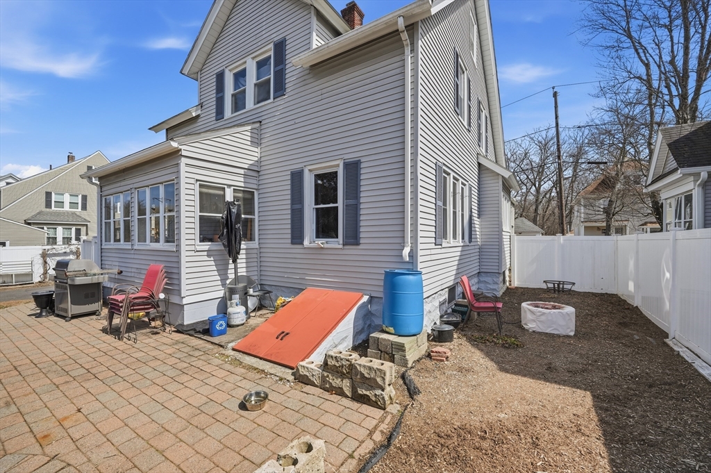 59 Woodmont Street West Springfield, MA 01089 - Photo 29 of 30 a backyard of a house with seating space