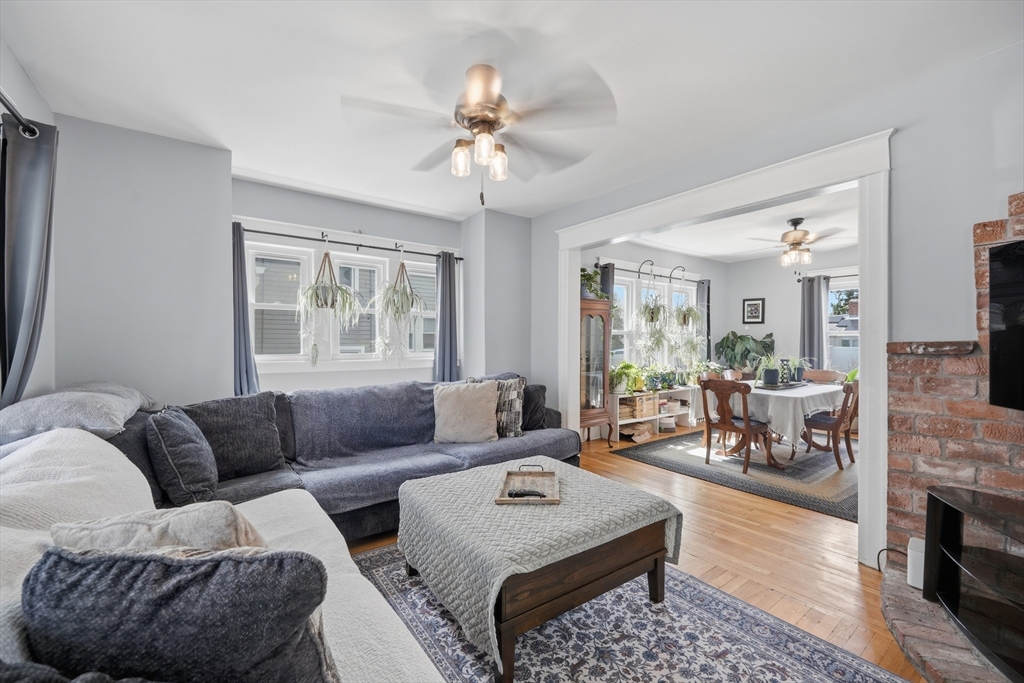 59 Woodmont Street West Springfield, MA 01089 - Photo 7 of 30 a living room with furniture and a large window