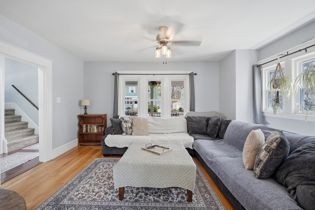 59 Woodmont Street West Springfield, MA 01089 - Photo 8 of 30 a living room with furniture and a large window