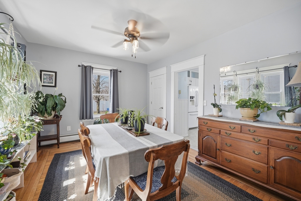 59 Woodmont Street West Springfield, MA 01089 - Photo 10 of 30 a view of a dining room with furniture and wooden floor