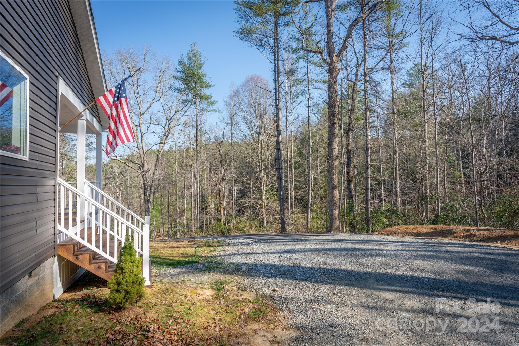 493 Patterson Road Hendersonville, NC 28739 - Photo 14 of 37 a view of a house with a yard