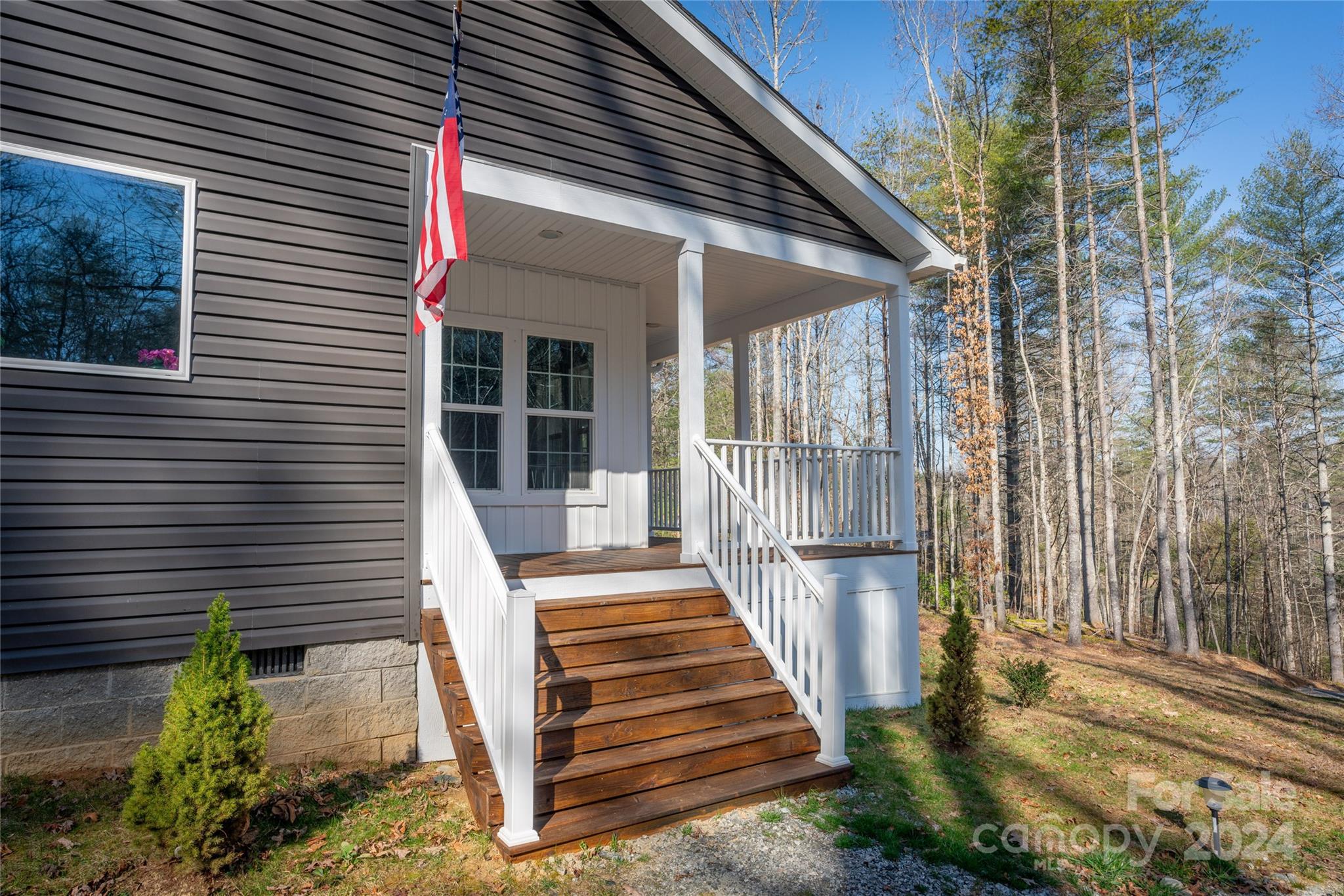 493 Patterson Road Hendersonville, NC 28739 - Photo 15 of 37 a front view of a house with a porch