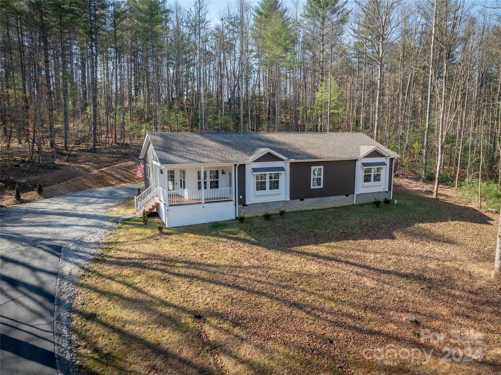 493 Patterson Road Hendersonville, NC 28739 - Photo 16 of 37 a view of a house with a yard