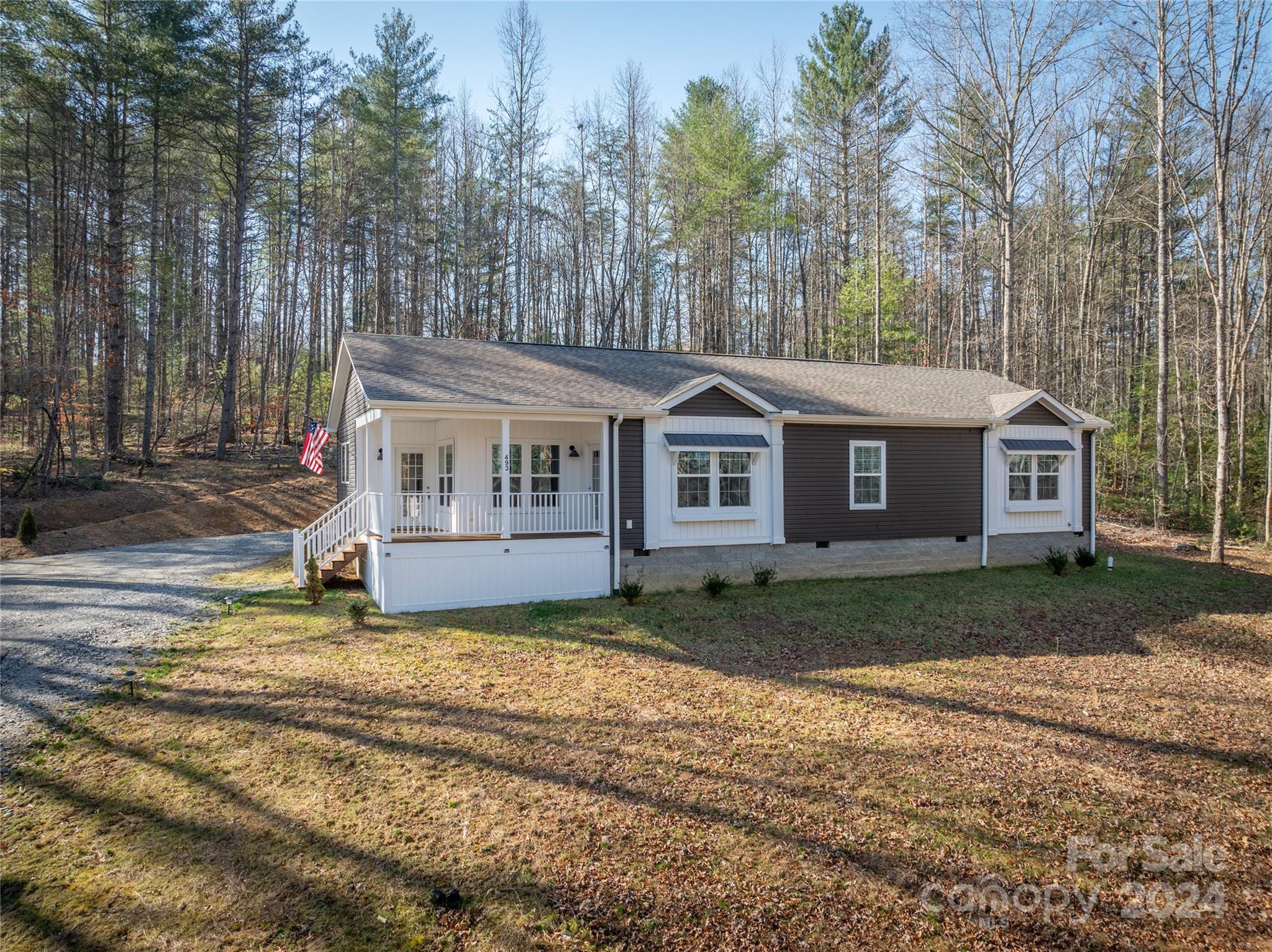 493 Patterson Road Hendersonville, NC 28739 - Photo 2 of 37 a view of a house with a yard