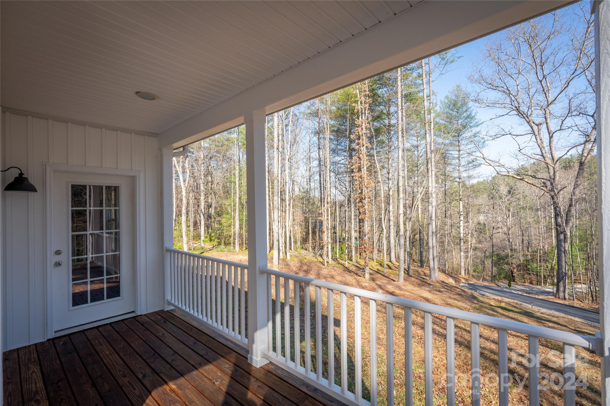 493 Patterson Road Hendersonville, NC 28739 - Photo 9 of 37 a view of a room with wooden floor and windows
