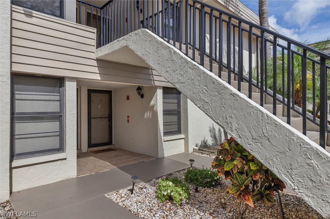 5625 Trailwinds Drive, Unit 412 Fort Myers, FL 33907 - Photo 25 of 40 a view of a house with a balcony