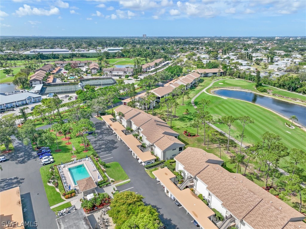 5625 Trailwinds Drive, Unit 412 Fort Myers, FL 33907 - Photo 30 of 40 an aerial view of residential houses with outdoor space