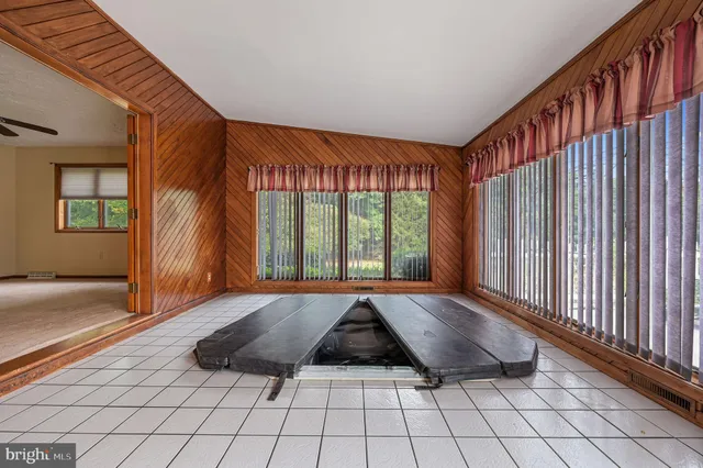 a view of a hallway with stairs