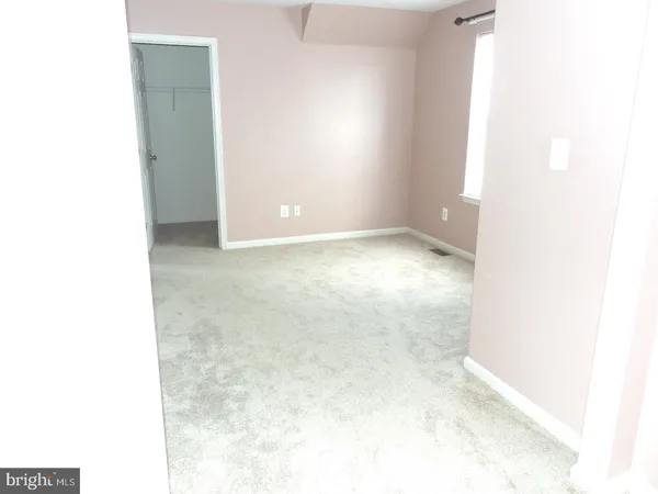 a view of a room with a window