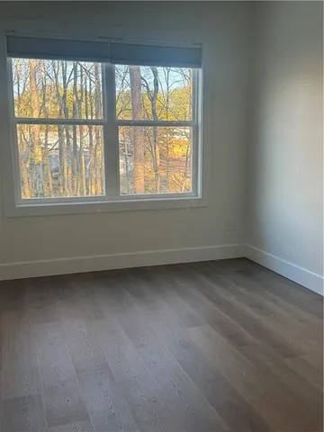 a view of a room that has a window in it