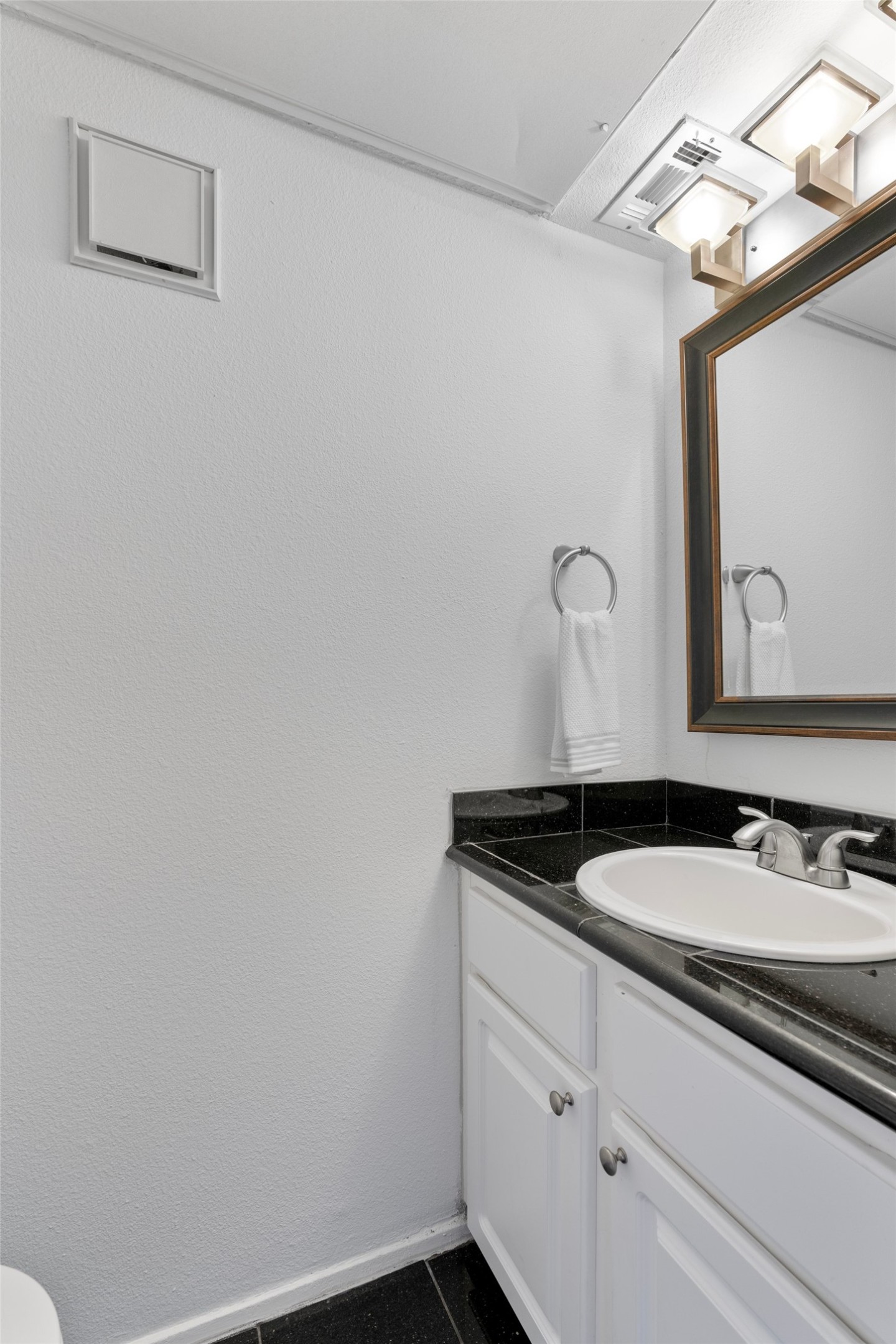 2018 West Rundberg Lane, Unit 16D Austin, TX 78758 - Photo 9 of 18 1/2 Bathroom on the first floor.