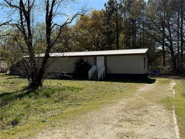 a view of outdoor space and yard