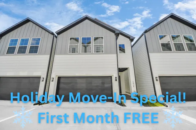 a front view of a house with a garage