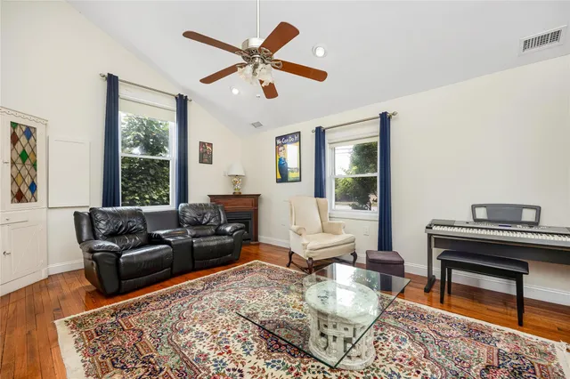 a living room with furniture and a window