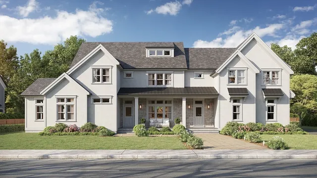 a front view of a house with a garden