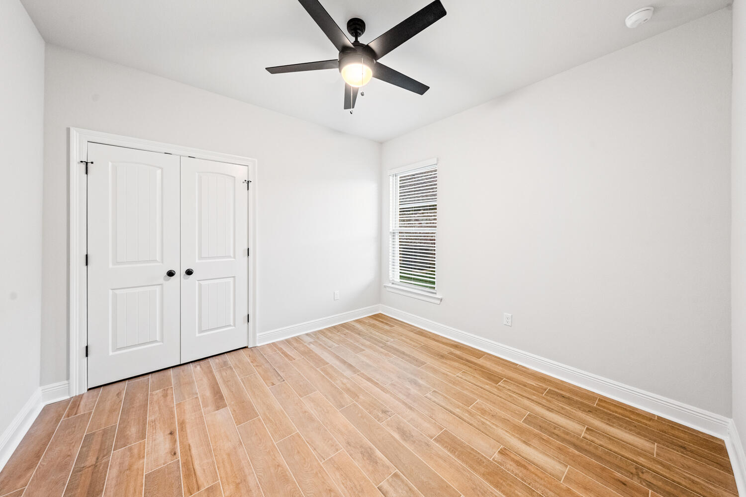 232 West Tweet Street Freeport, FL 32439 - Photo 17 of 23 a view of an empty room with a window