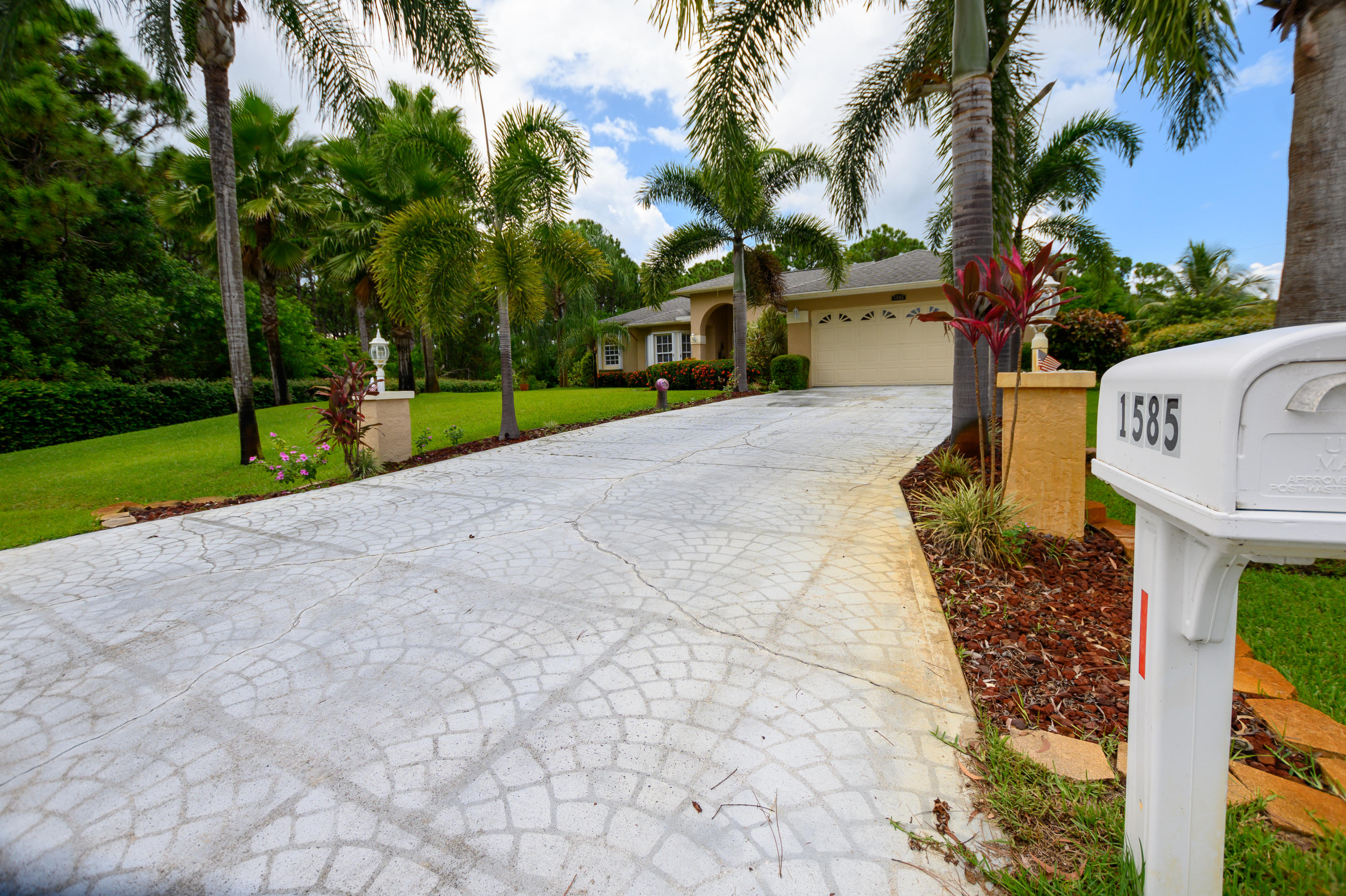 1585 Southwest Flagami Road Port St. Lucie, FL 34953 - Photo 22 of 23 DRIVEWAY