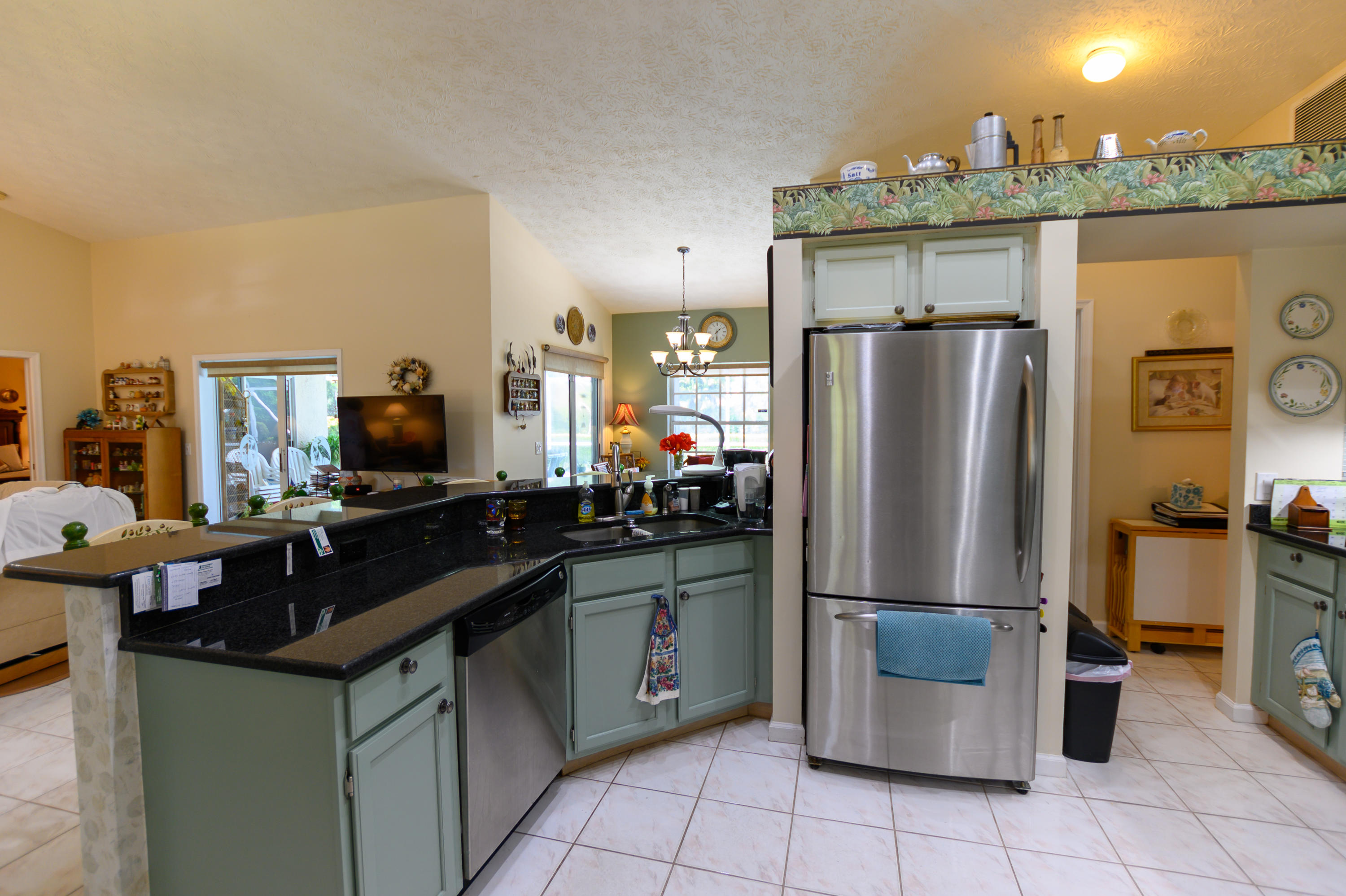 1585 Southwest Flagami Road Port St. Lucie, FL 34953 - Photo 5 of 23 OPEN KITCHEN