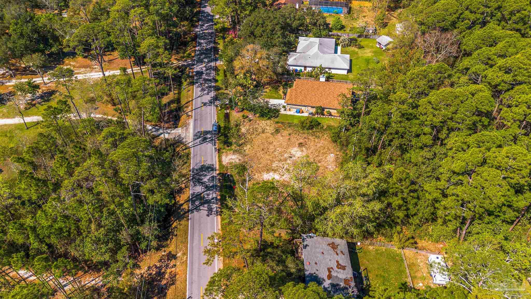 Soundside Drive Gulf Breeze, FL 32563 - Photo 7 of 16 an aerial view of residential house with outdoor space