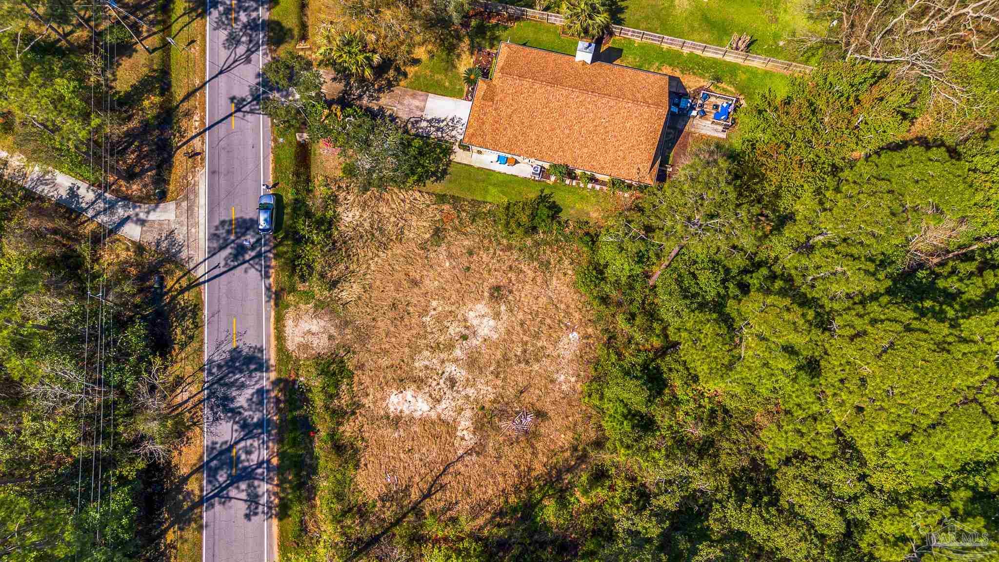 Soundside Drive Gulf Breeze, FL 32563 - Photo 8 of 16 a picture of a tree
