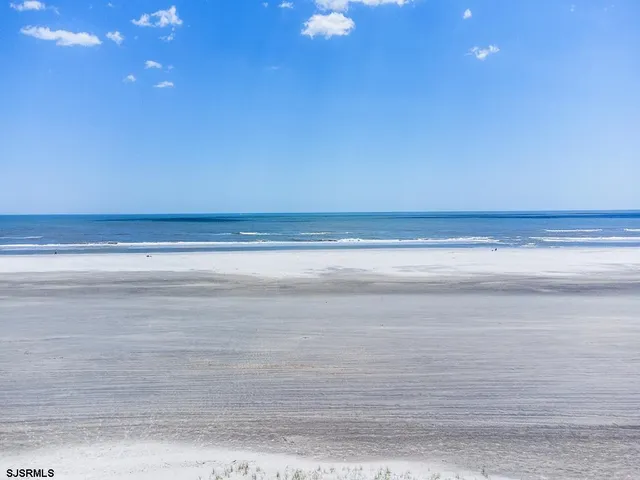 a view of beach and ocean