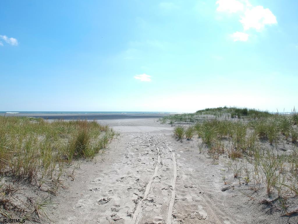 330 42nd Street South, Unit B15 Brigantine, NJ 08203 - Photo 4 of 21 a view of lake with mountain