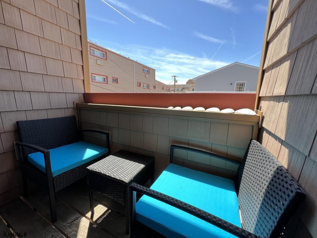 330 42nd Street South, Unit B15 Brigantine, NJ 08203 - Photo 8 of 21 a view of outdoor space with seating