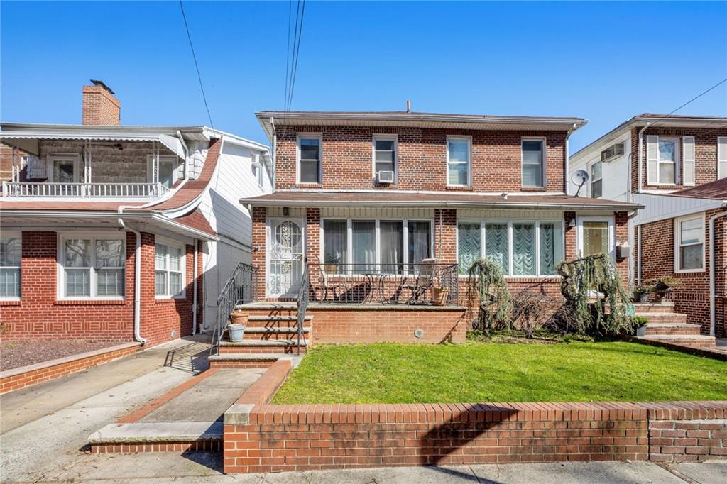 25 89th Street Brooklyn, NY 11209 - Photo 2 of 20 a front view of a house with garden