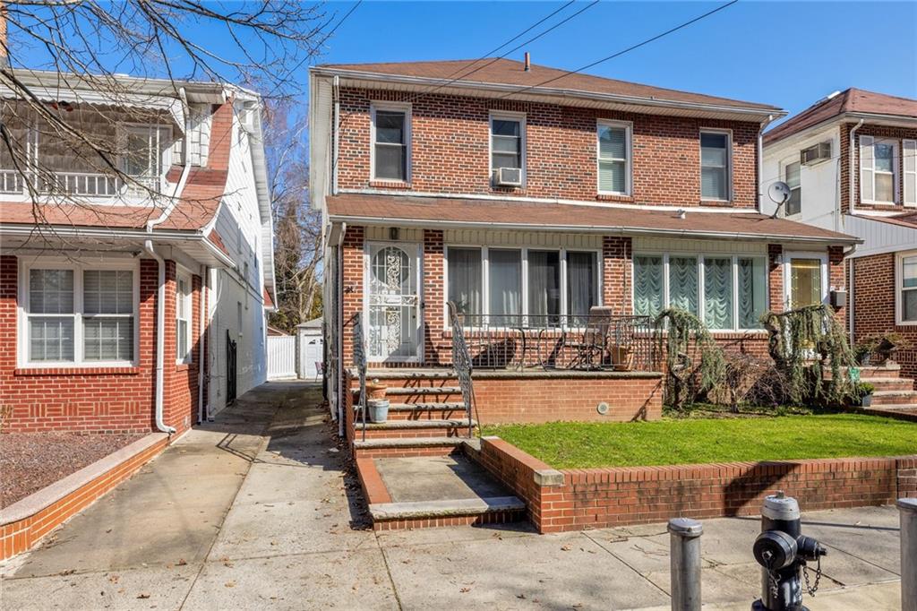 25 89th Street Brooklyn, NY 11209 - Photo 3 of 20 a view of a house with a yard patio and a patio