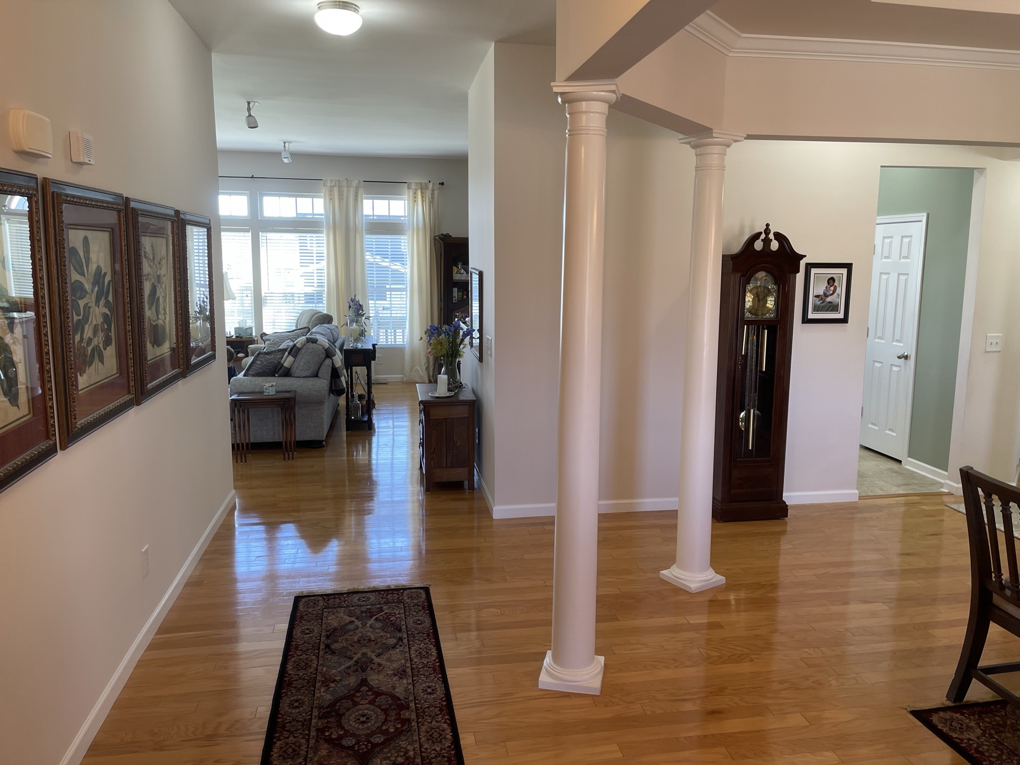 1003 Kyle Road Spring Hill, TN 37174 - Photo 4 of 24 a view of a hallway with living room and furniture