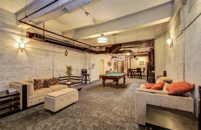 a outdoor space with patio furniture and a fireplace