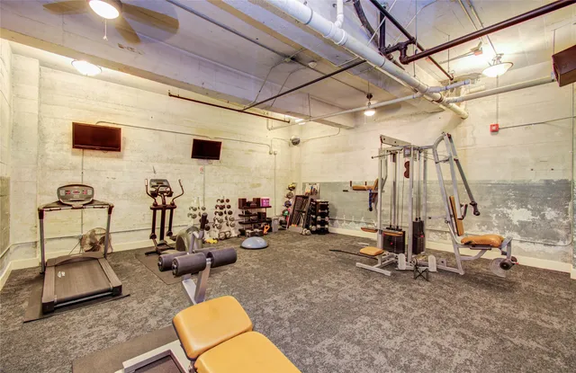 a view of a room with gym equipment