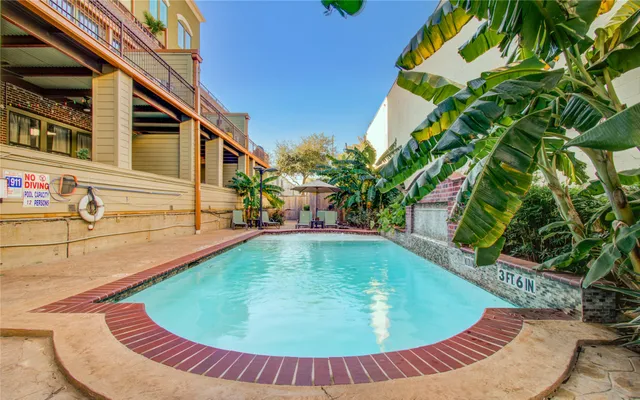a view of outdoor space and swimming pool