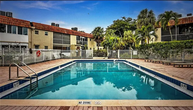 a view of a house with swimming pool