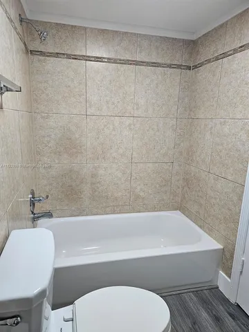 a bathroom with a sink and a bathtub