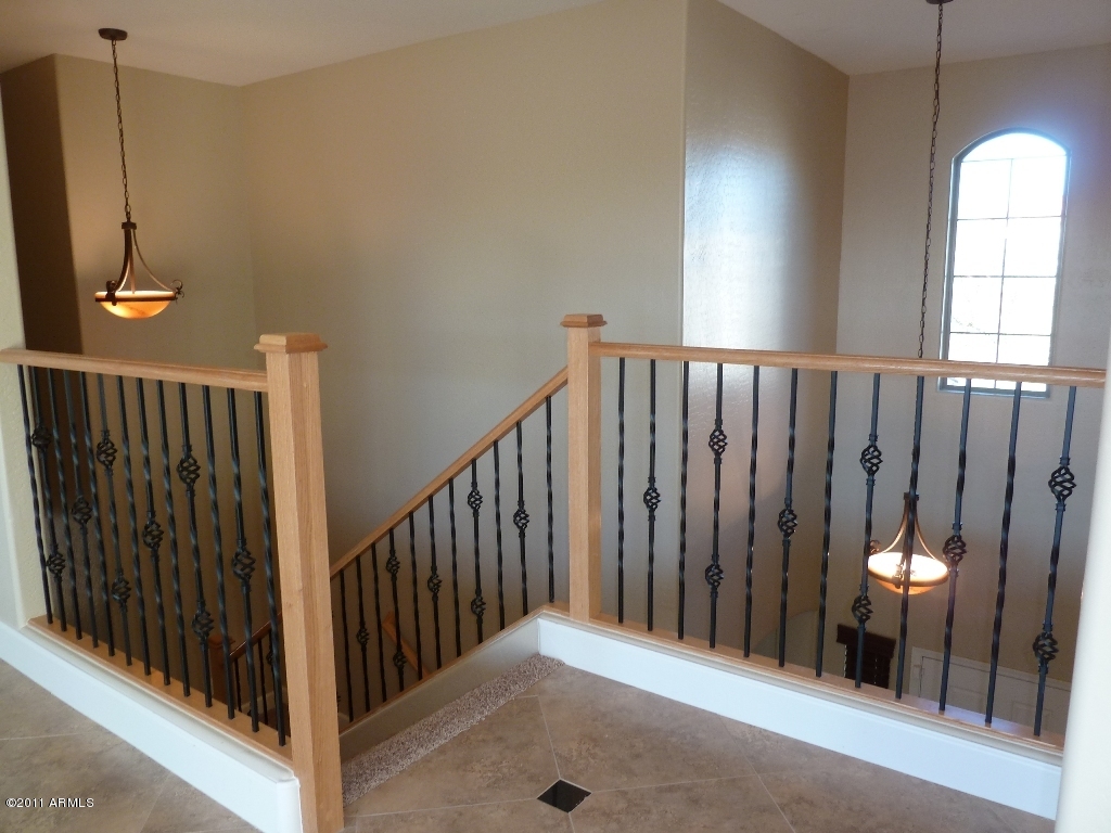 13651 West Calavar Road Surprise, AZ 85379 - Photo 13 of 29 Gorgeous wood/iron stair case