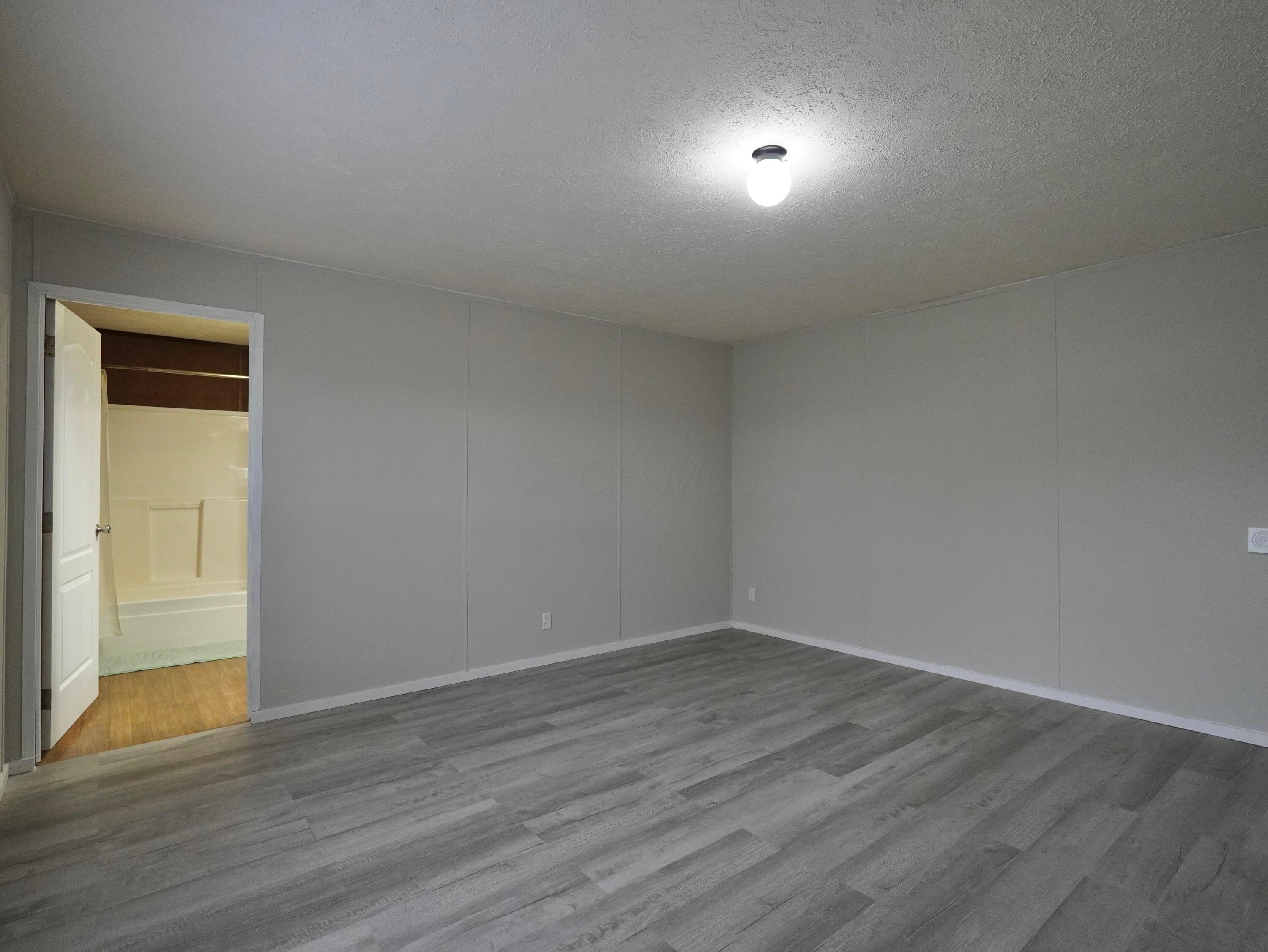 8565 Smith-Calhoun Road, Unit 128 Plain City, OH 43064 - Photo 11 of 22 Primary Suite