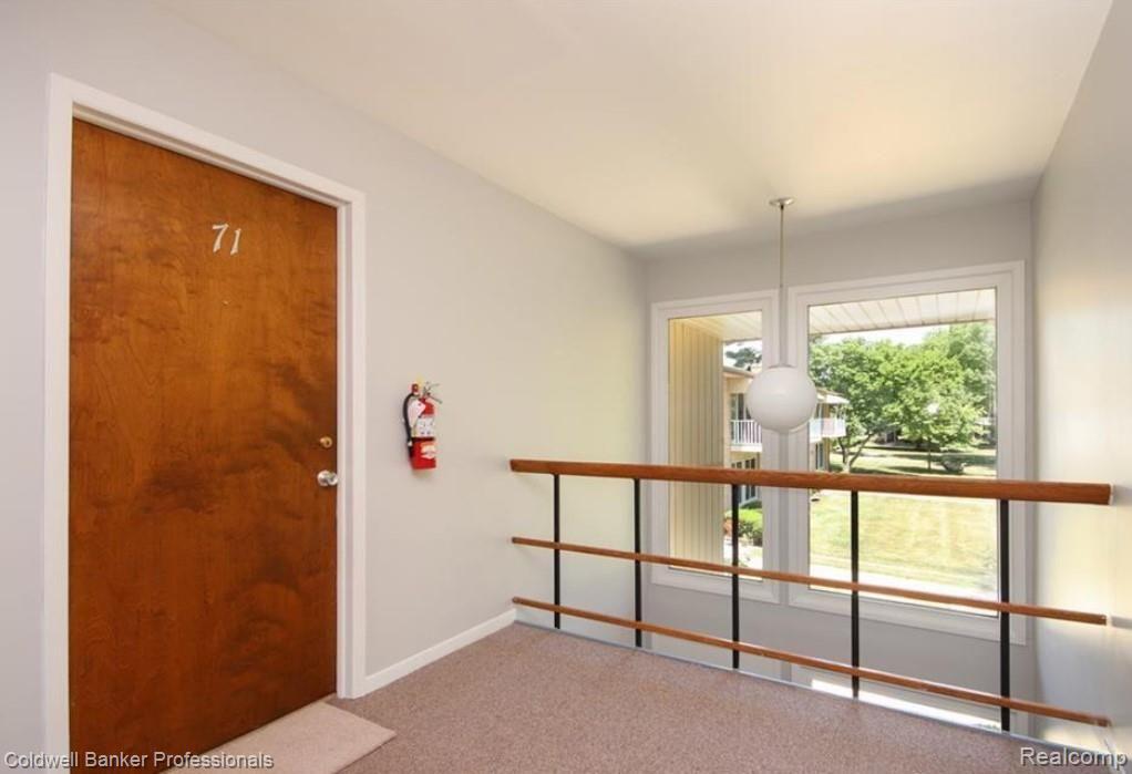 1199 South Sheldon Road, Unit J71 Plymouth, MI 48170 - Photo 2 of 37 Front door of Unit J71