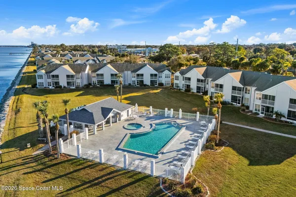 a view of a city with lawn chairs