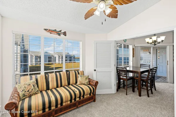a view of a livingroom and dining room
