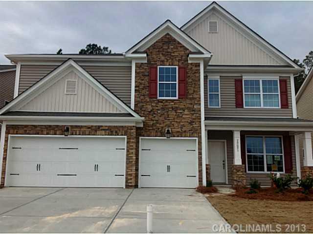 79031 Ridgehaven Road, Unit 175 Lancaster, SC 29720 - Photo 1 of 1 a front view of a house with a yard
