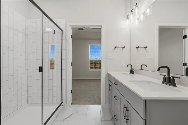 a view of an empty room with a bathroom