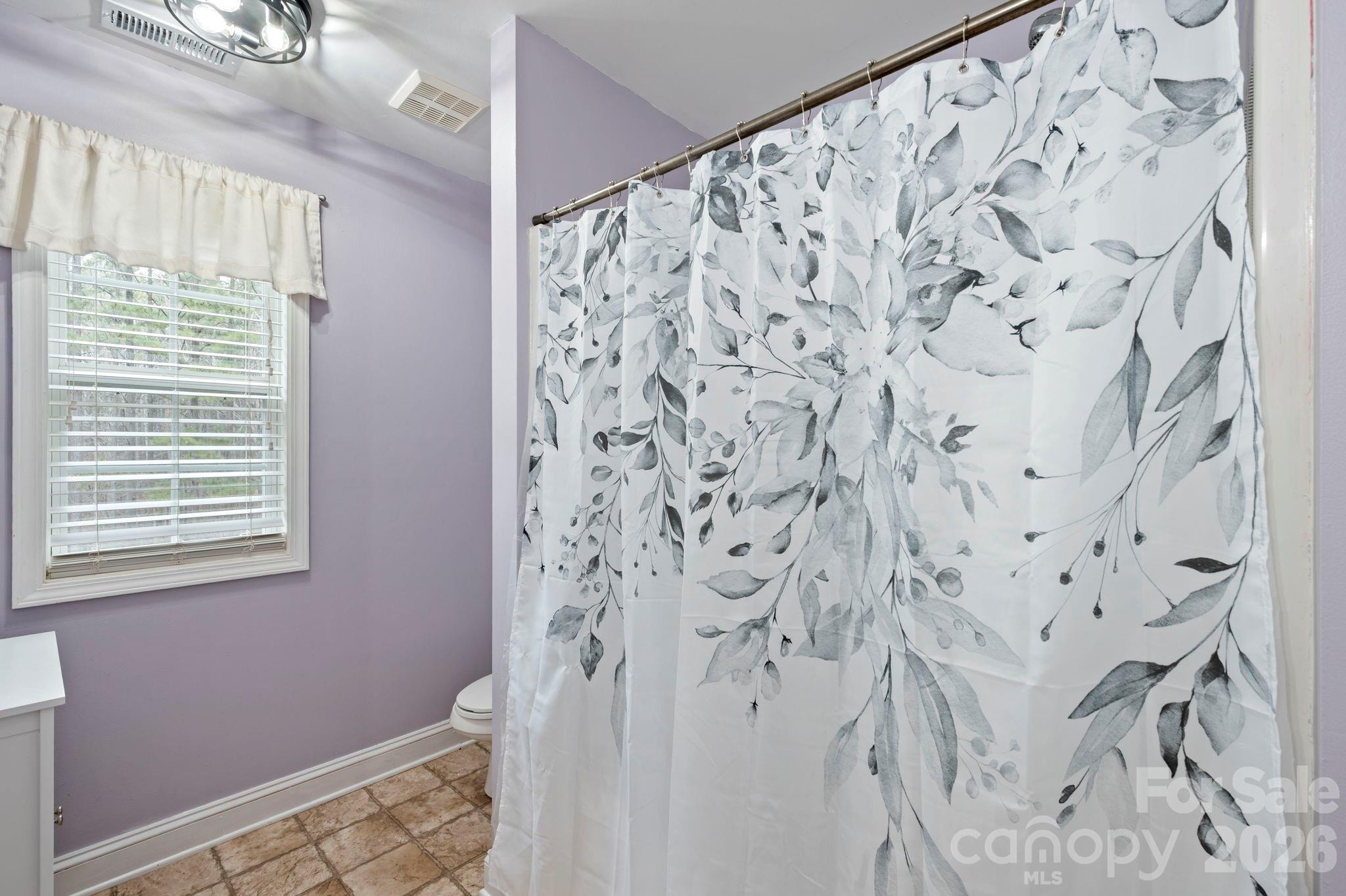 1606 High Ridge Drive Stanley, NC 28164 - Photo 27 of 43 a view of a window and shower curtain