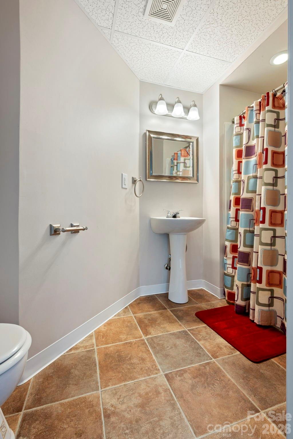1606 High Ridge Drive Stanley, NC 28164 - Photo 33 of 43 a bathroom with a sink toilet and shower