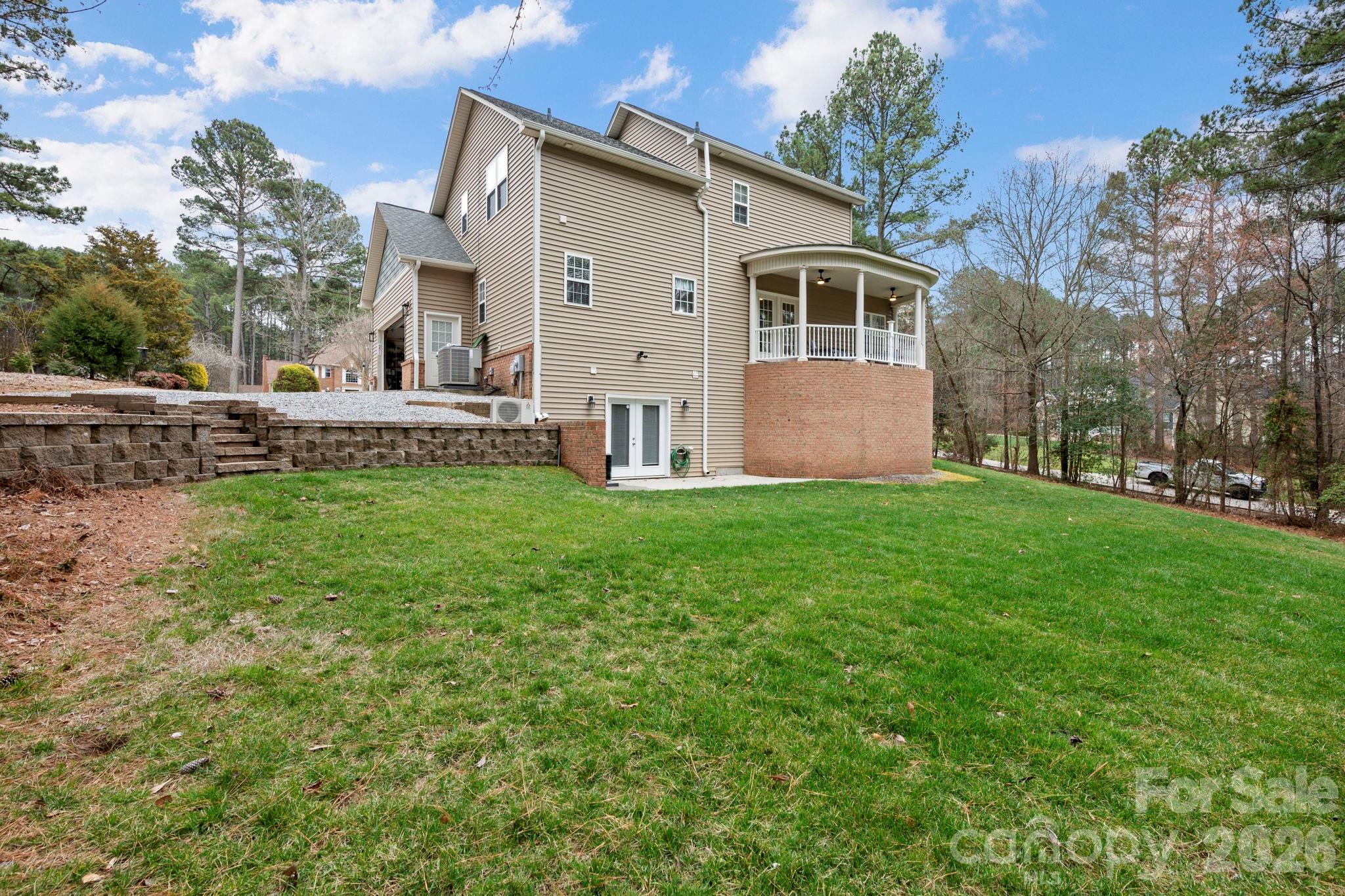1606 High Ridge Drive Stanley, NC 28164 - Photo 36 of 43 a view of a house with a yard and sitting area