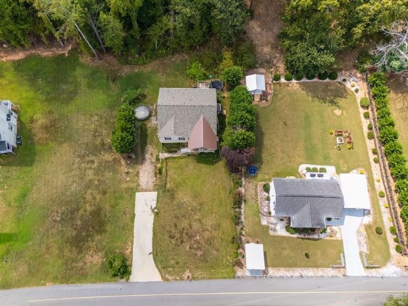 43 Mimosa Street Buchanan, GA 30113 - Photo 23 of 33 an aerial view of a house with a yard
