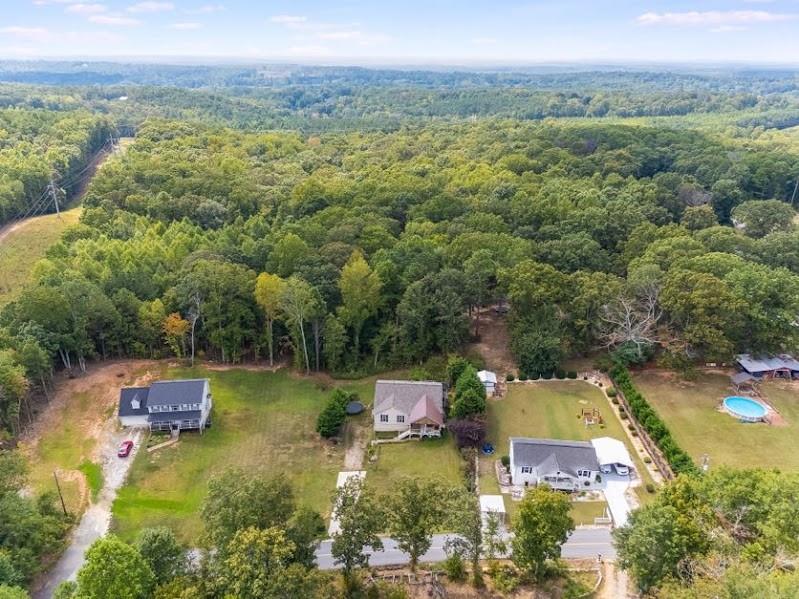 43 Mimosa Street Buchanan, GA 30113 - Photo 5 of 33 an aerial view of a house with a garden