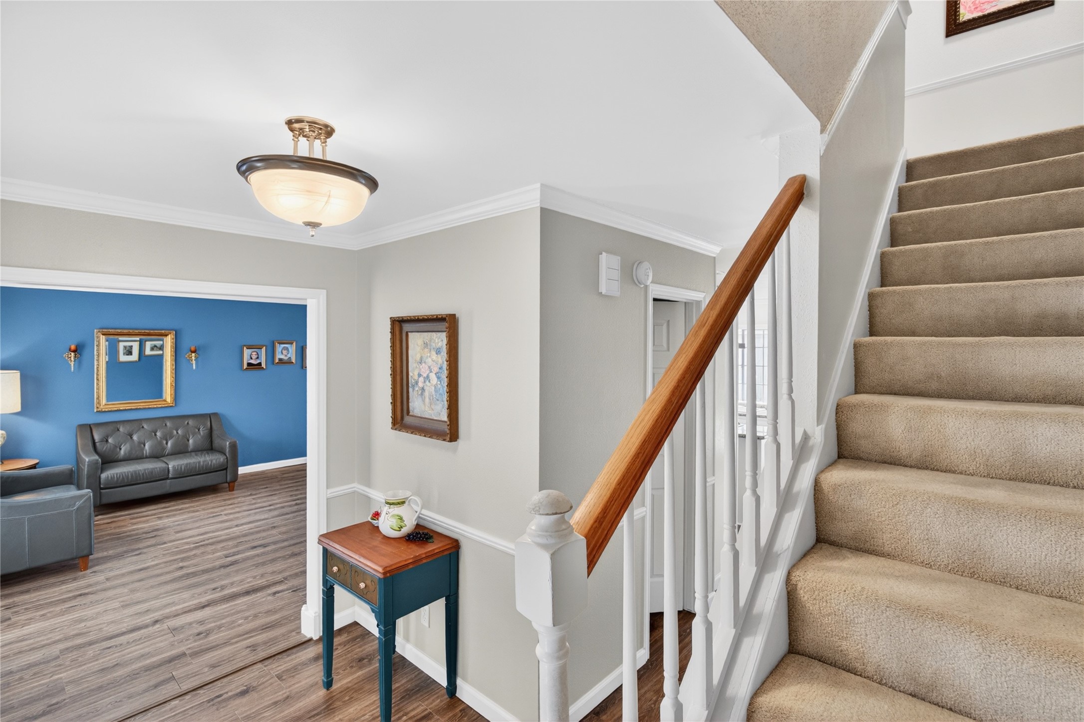 20214 Woodsboro Court Spring, TX 77388 - Photo 26 of 50 Entry Hall & Stairs to Second Floor! Door to Powder Half Bath! Recently Painted Interior! Luxury Vinyl Plank throughout 1st Floor!