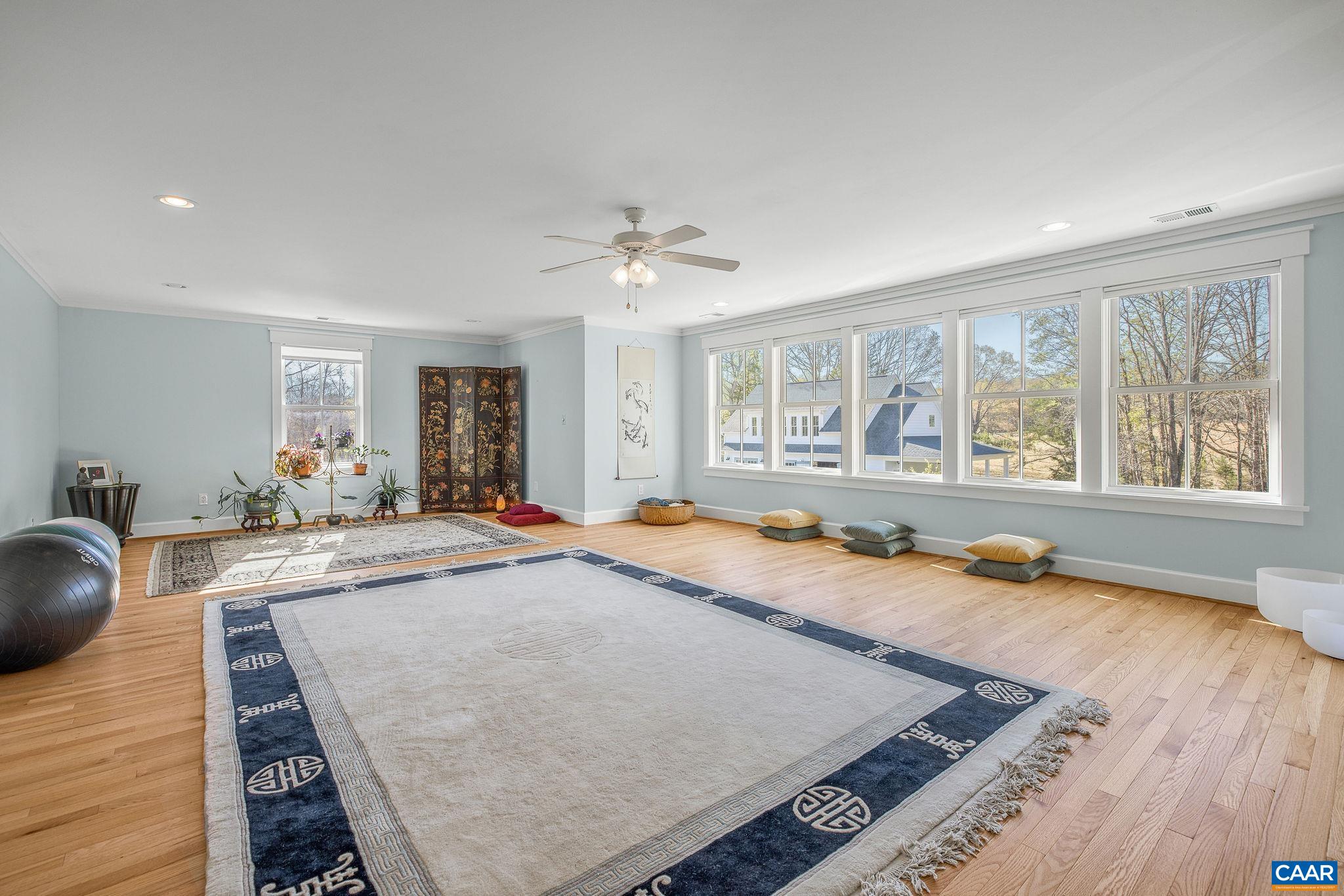 4764 Advance Mills Road Earlysville, VA 22936 - Photo 61 of 72 a living room with furniture and a large window